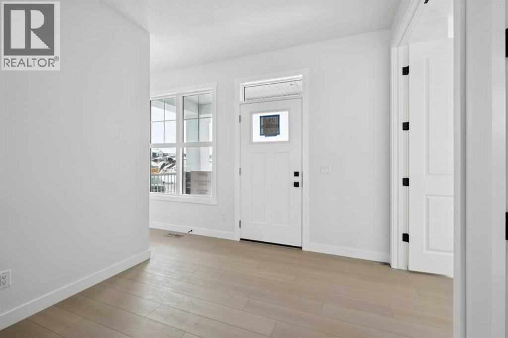 214 Harmony Circle, Rural Rocky View County, Alberta  T3Z 0K9 - Photo 4 - A2291912