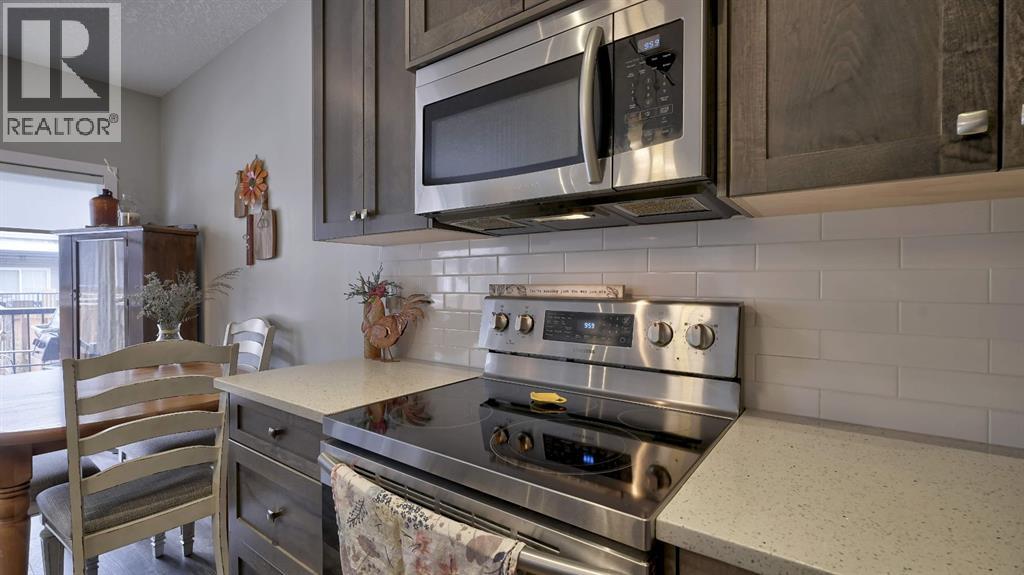 135 Reunion Loop Nw, Airdrie, Alberta  T4B 4J6 - Photo 12 - A2291091