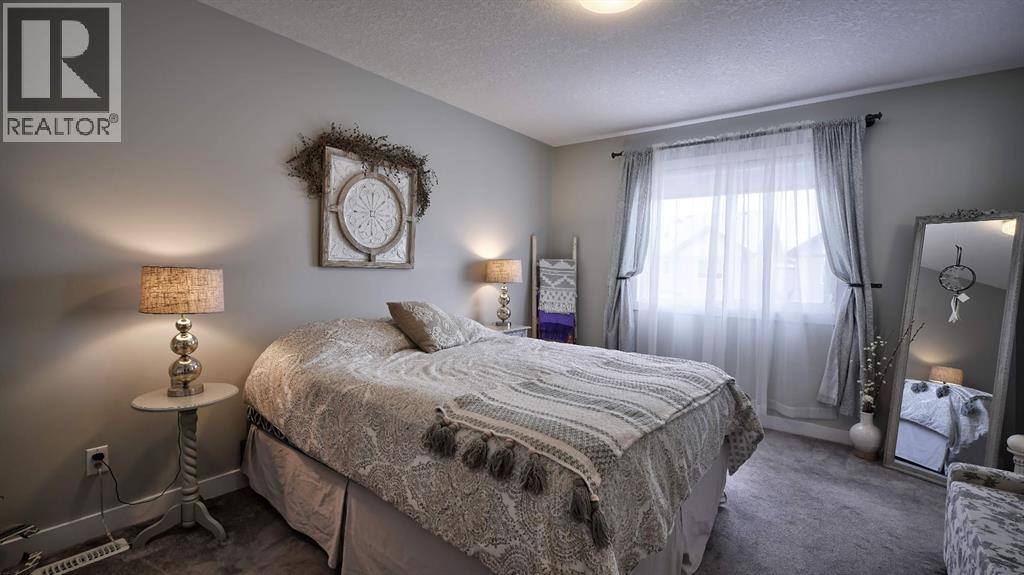 135 Reunion Loop Nw, Airdrie, Alberta  T4B 4J6 - Photo 23 - A2291091