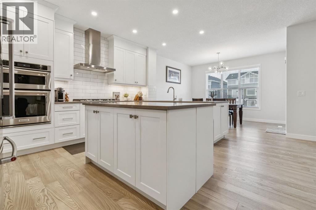 55 Sundown Crescent, Cochrane, Alberta  T4C 2T2 - Photo 4 - A2304597