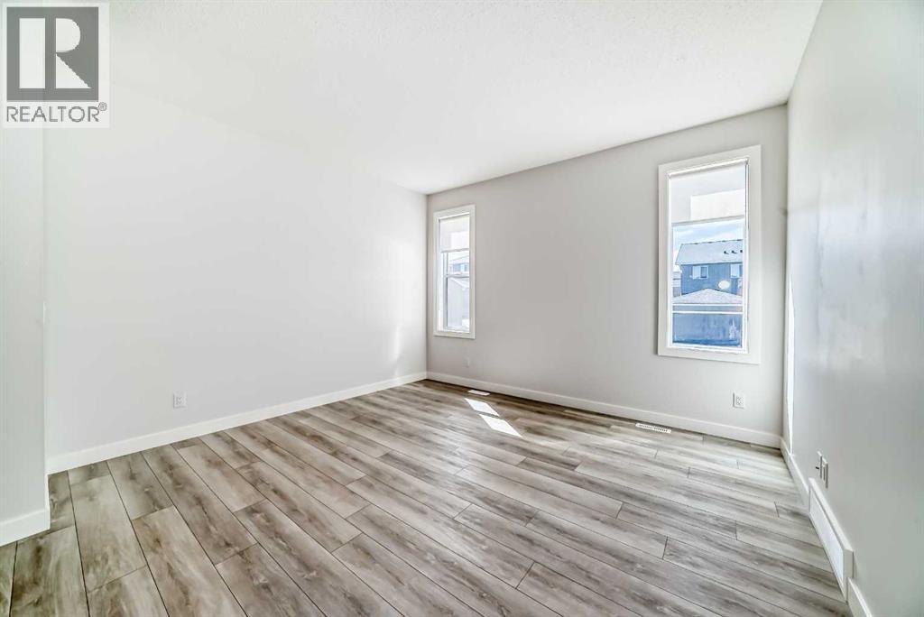 121 Ambleside Heath Nw, Calgary, Alberta  T3P 1S4 - Photo 9 - A2303332