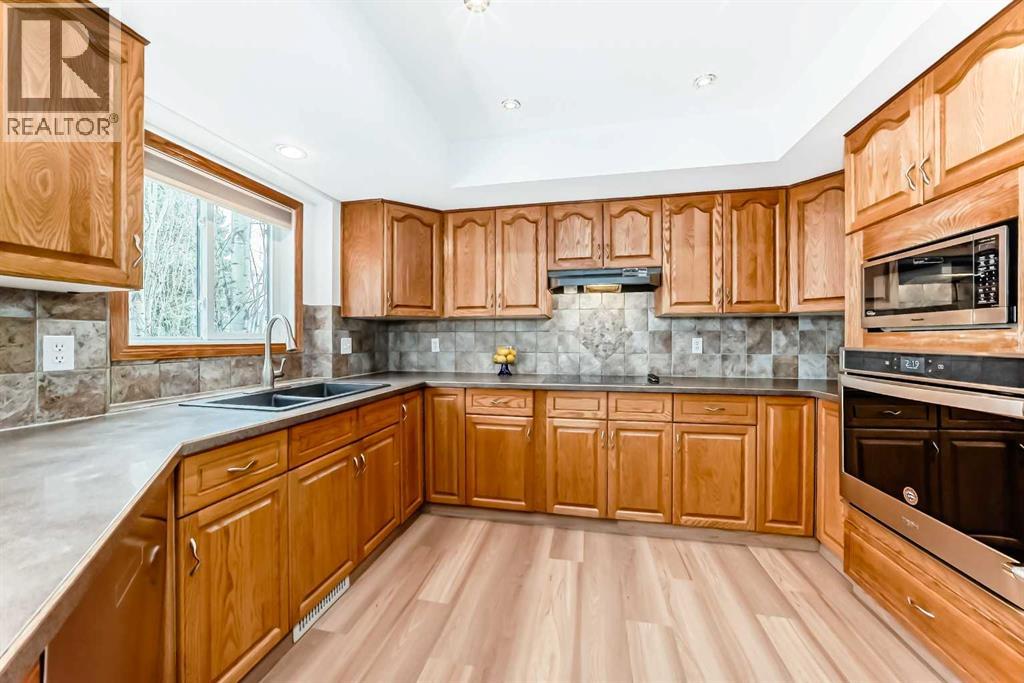 5 Woodmark Place Sw, Calgary, Alberta  T2W 6A2 - Photo 12 - A2304368