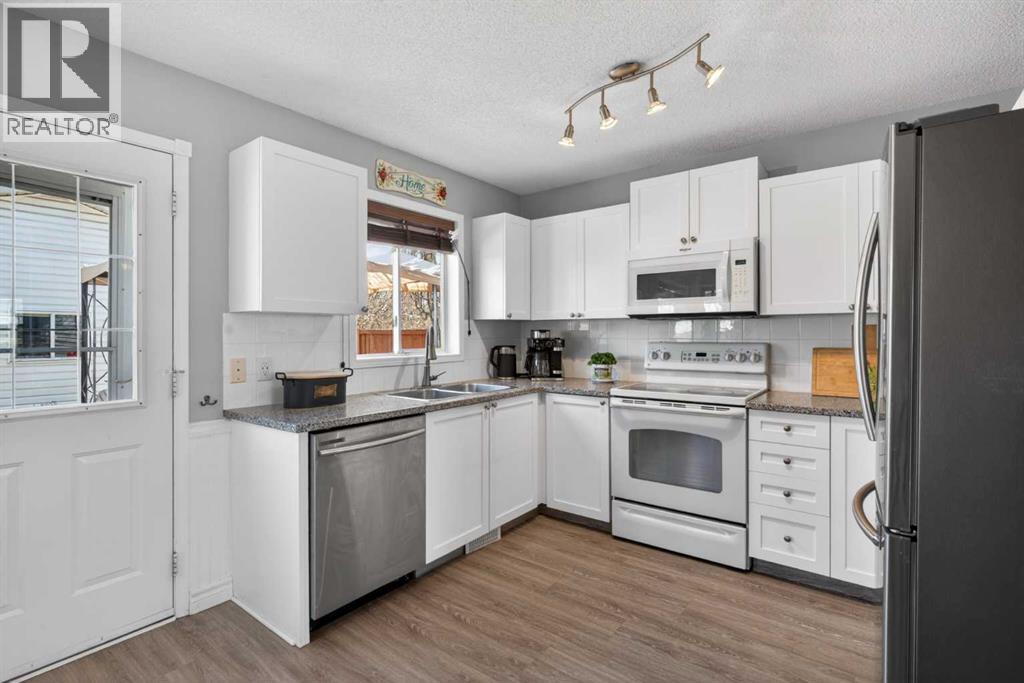 14744 Mt Mckenzie Drive Se, Calgary, Alberta  T2Z 2V1 - Photo 10 - A2303004