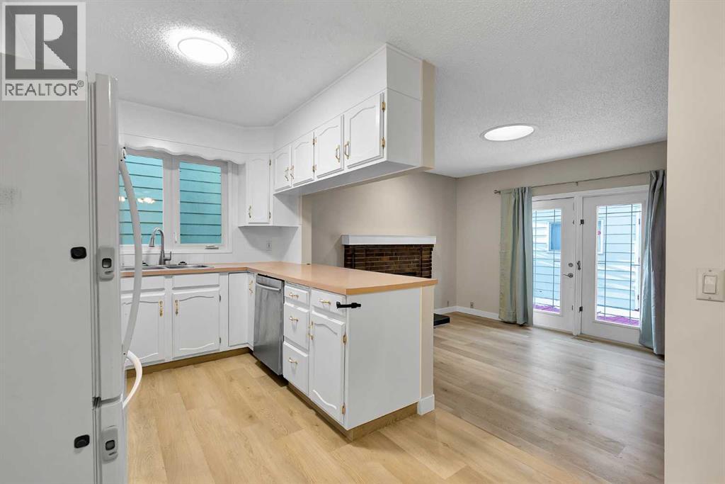 1111 Berkley Drive NW, Calgary, Alberta  T3K 1S6 - Photo 12 - A2294270