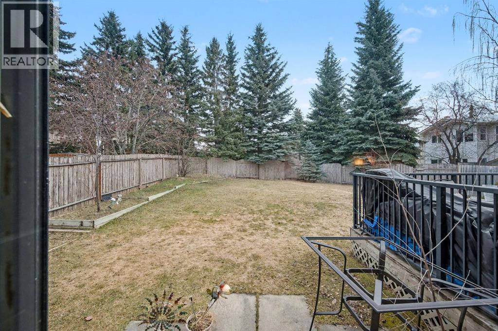 983 Woodbine Boulevard SW, Calgary, Alberta  t2w 4a7 - Photo 2 - A2301604