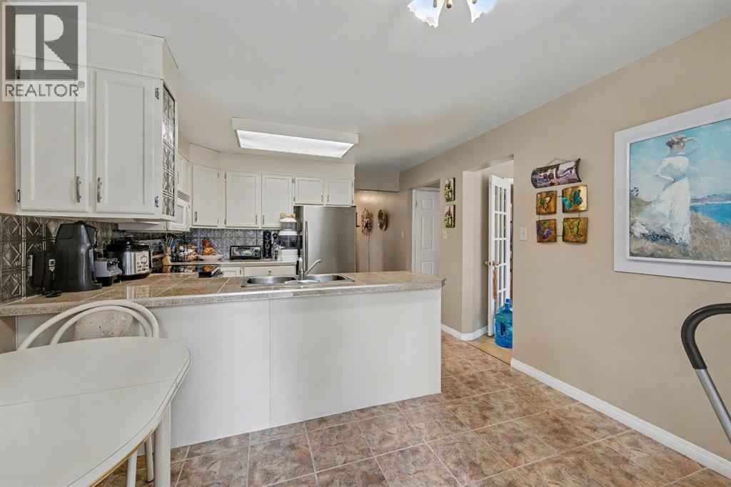 983 Woodbine Boulevard SW, Calgary, Alberta  t2w 4a7 - Photo 18 - A2301604