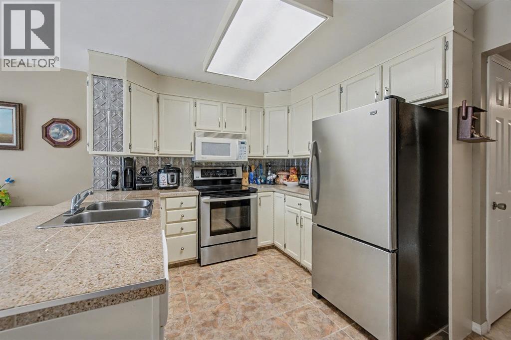 983 Woodbine Boulevard SW, Calgary, Alberta  t2w 4a7 - Photo 15 - A2301604