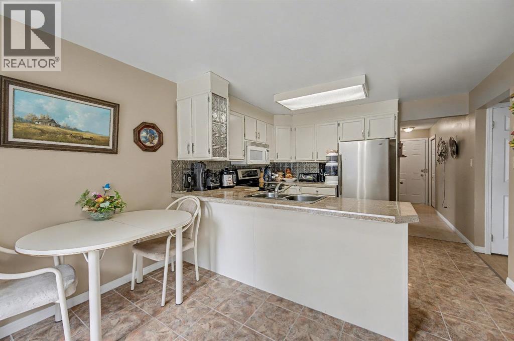 983 Woodbine Boulevard SW, Calgary, Alberta  t2w 4a7 - Photo 16 - A2301604