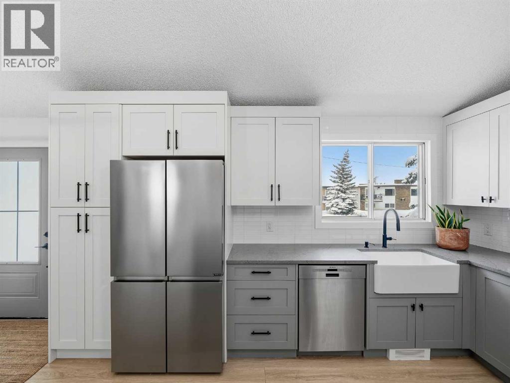 7723 Hunterview Drive Nw, Calgary, Alberta  T2K 4P8 - Photo 3 - A2296844