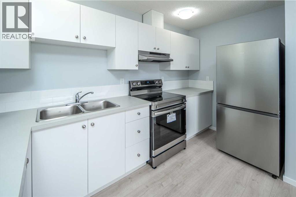 47 Bermuda Way Nw, Calgary, Alberta  T3K 1H1 - Photo 3 - A2304443