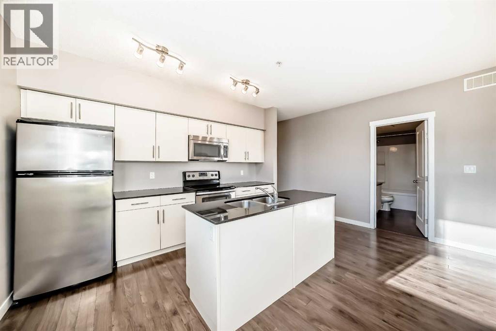 304, 1740 9 Street NW, Calgary, Alberta  T2M 4Z5 - Photo 2 - A2299812