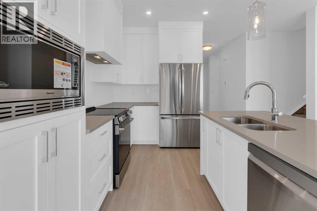 1321 South Point Parade Sw, Airdrie, Alberta  T4B 0Y7 - Photo 10 - A2303901