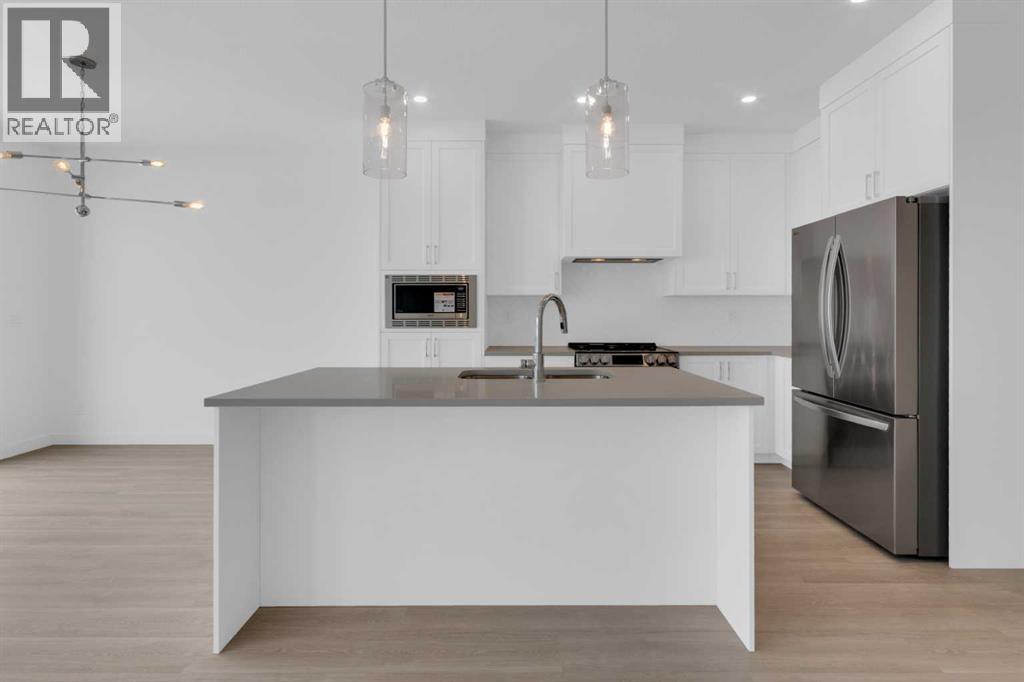 1321 South Point Parade Sw, Airdrie, Alberta  T4B 0Y7 - Photo 7 - A2303901