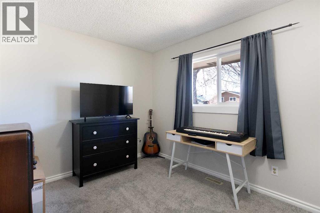 23 Queen Isabella Close Se, Calgary, Alberta  T2J 3R2 - Photo 13 - A2303904