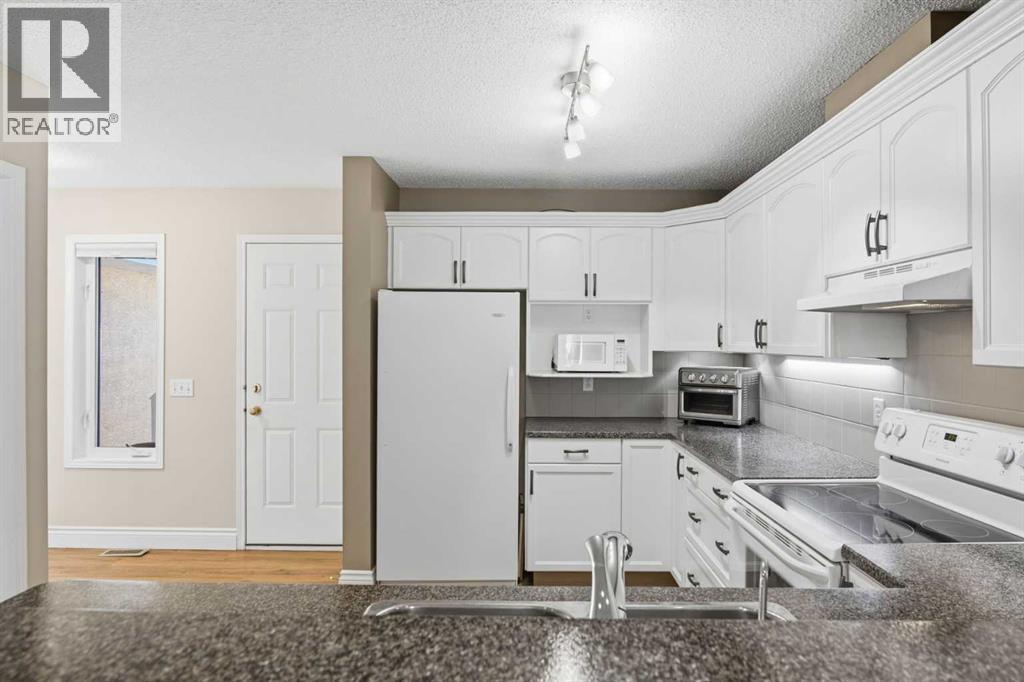 55 Cedarview Mews SW, Calgary, Alberta  T2W 6H8 - Photo 8 - A2304028