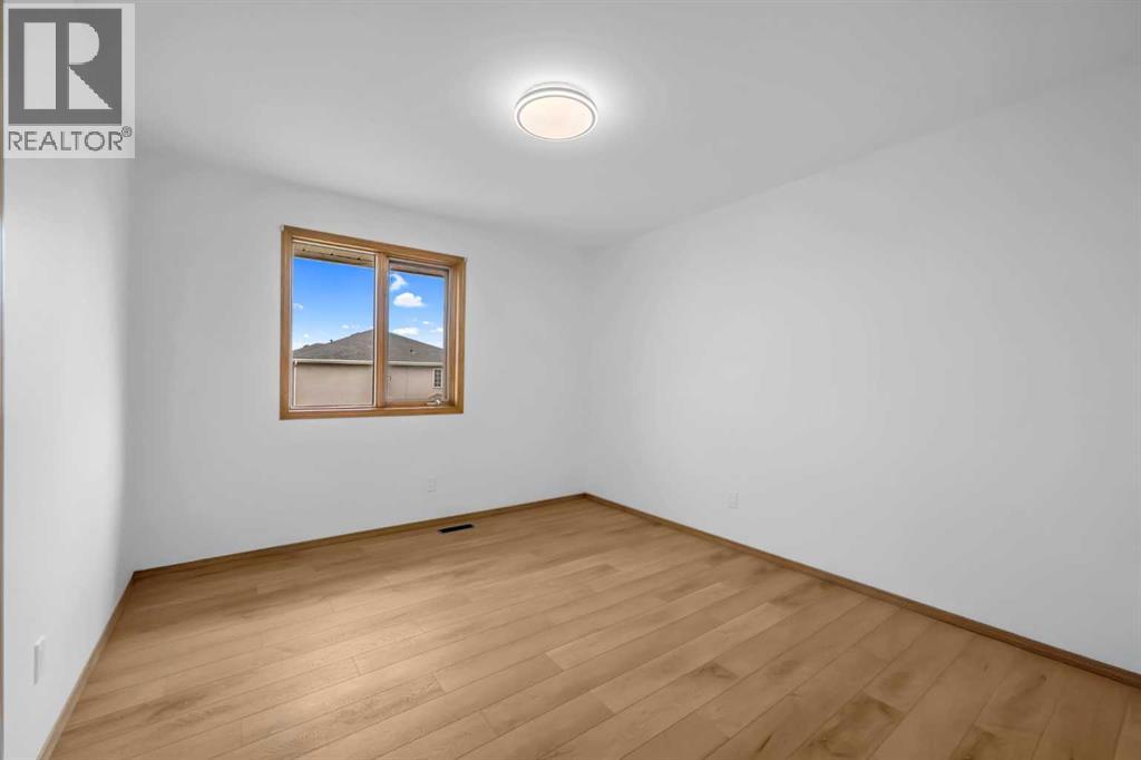 208 Coral Shores Bay Ne, Calgary, Alberta  T3J 3J6 - Photo 38 - A2304671