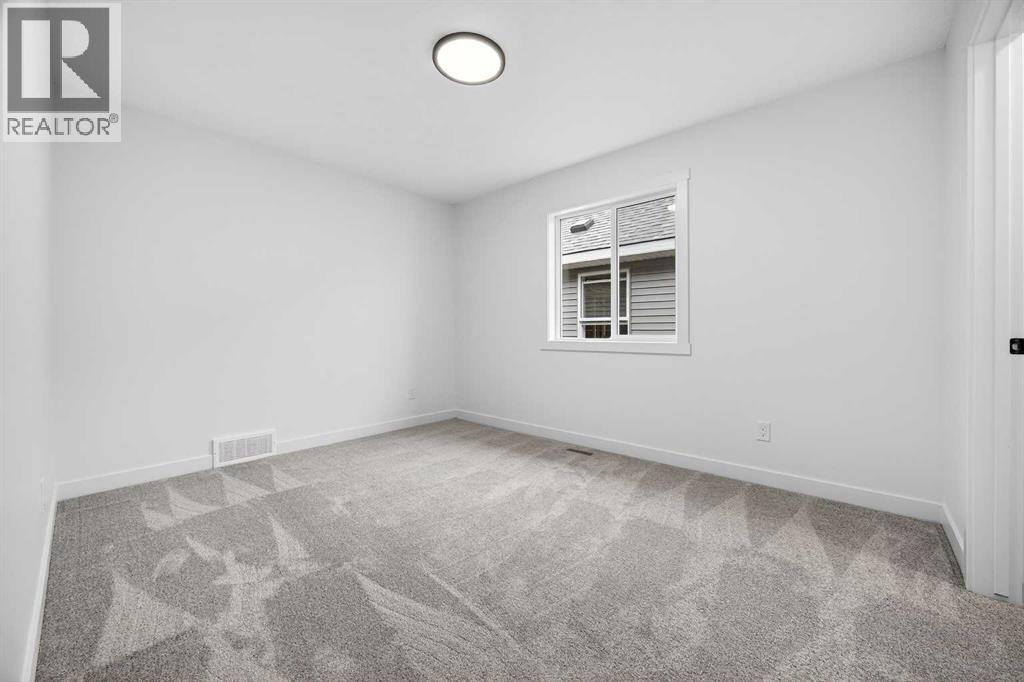 214 Bayview Park SW, Airdrie, Alberta  T4B 4G2 - Photo 25 - A2301120