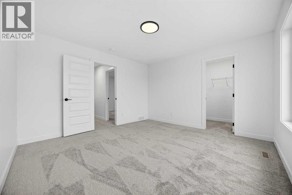 214 Bayview Park SW, Airdrie, Alberta  T4B 4G2 - Photo 28 - A2301120