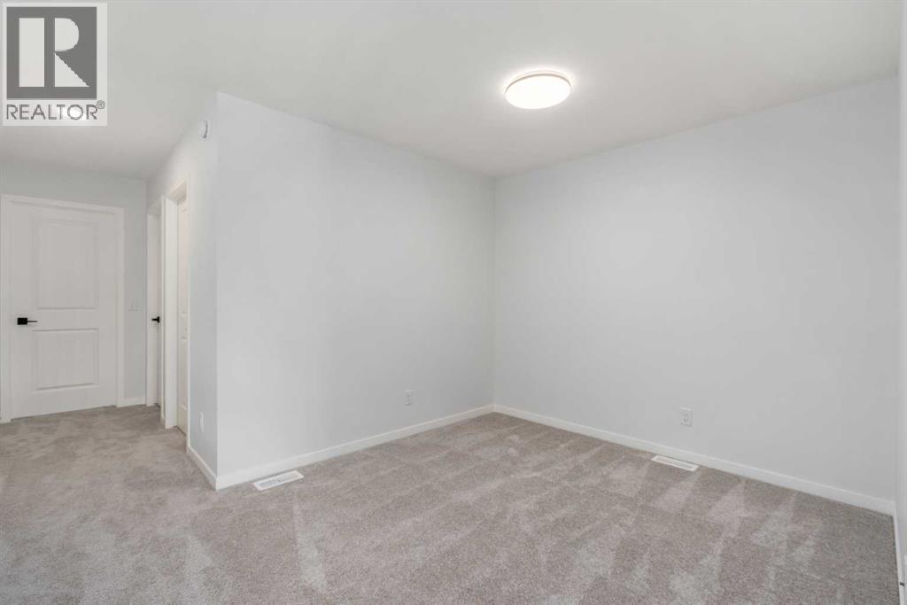 624 Rowmont Boulevard Nw, Calgary, Alberta  T3L 0L5 - Photo 15 - A2302214