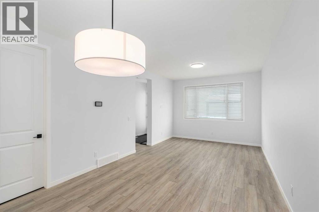 624 Rowmont Boulevard Nw, Calgary, Alberta  T3L 0L5 - Photo 9 - A2302214