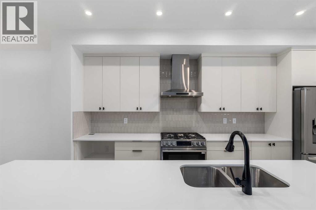 624 Rowmont Boulevard Nw, Calgary, Alberta  T3L 0L5 - Photo 5 - A2302214