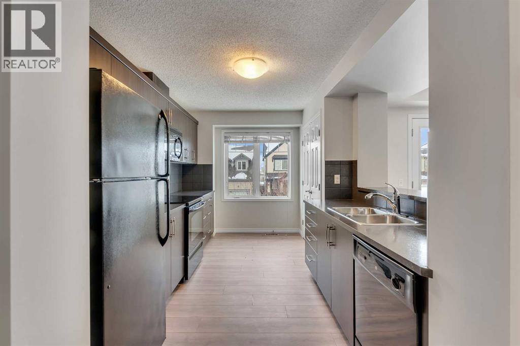 165 Windstone Avenue Sw, Airdrie, Alberta  T4B 3R3 - Photo 6 - A2298524