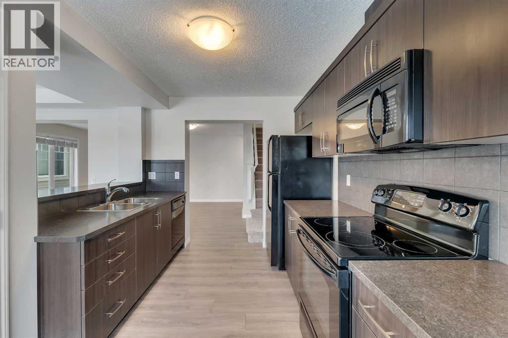 165 Windstone Avenue Sw, Airdrie, Alberta  T4B 3R3 - Photo 9 - A2298524