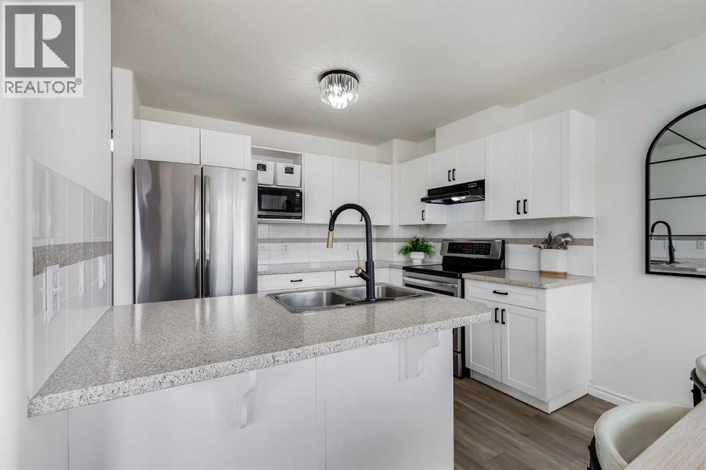 15, 102 Canoe Square Sw, Airdrie, Alberta  T4B 2Z1 - Photo 3 - A2302539