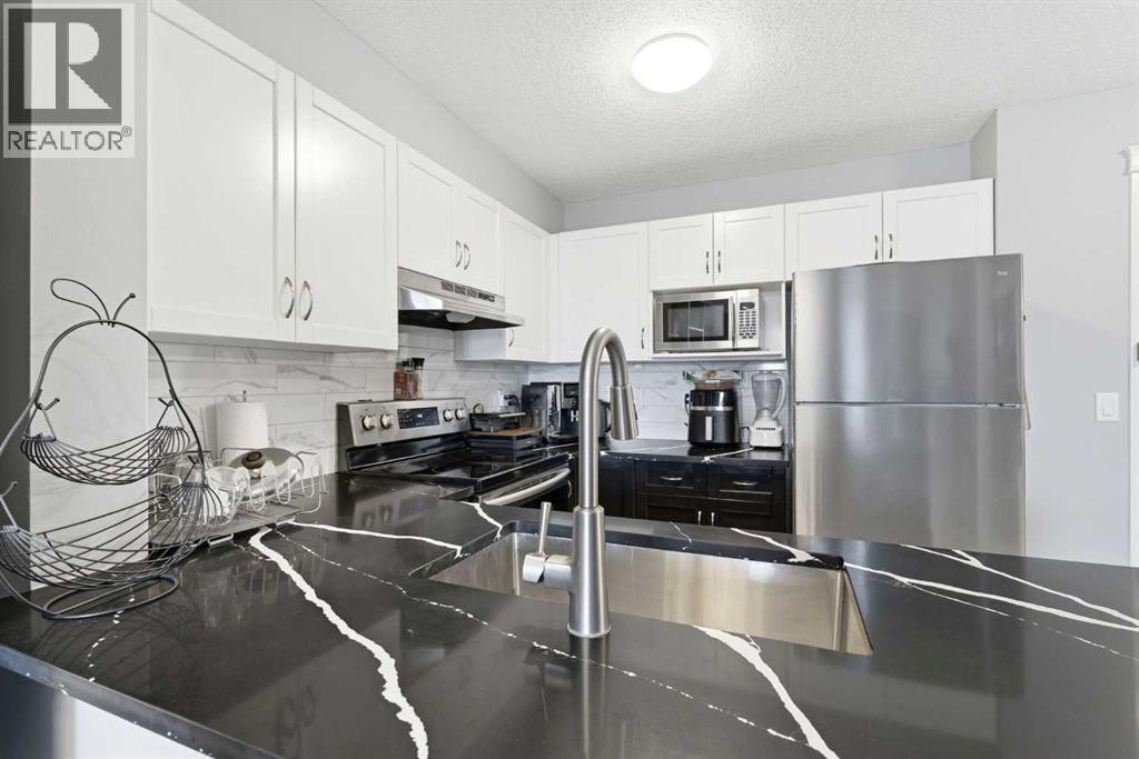 7206, 70 Panamount Drive Nw, Calgary, Alberta  T3K 6G8 - Photo 8 - A2304911