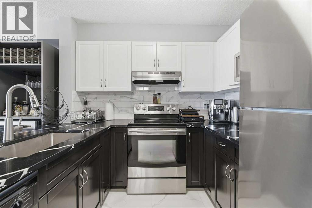 7206, 70 Panamount Drive Nw, Calgary, Alberta  T3K 6G8 - Photo 6 - A2304911