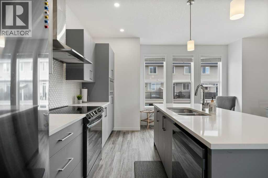 409 South Point Lane Sw, Airdrie, Alberta  T4B 5G8 - Photo 7 - A2304977