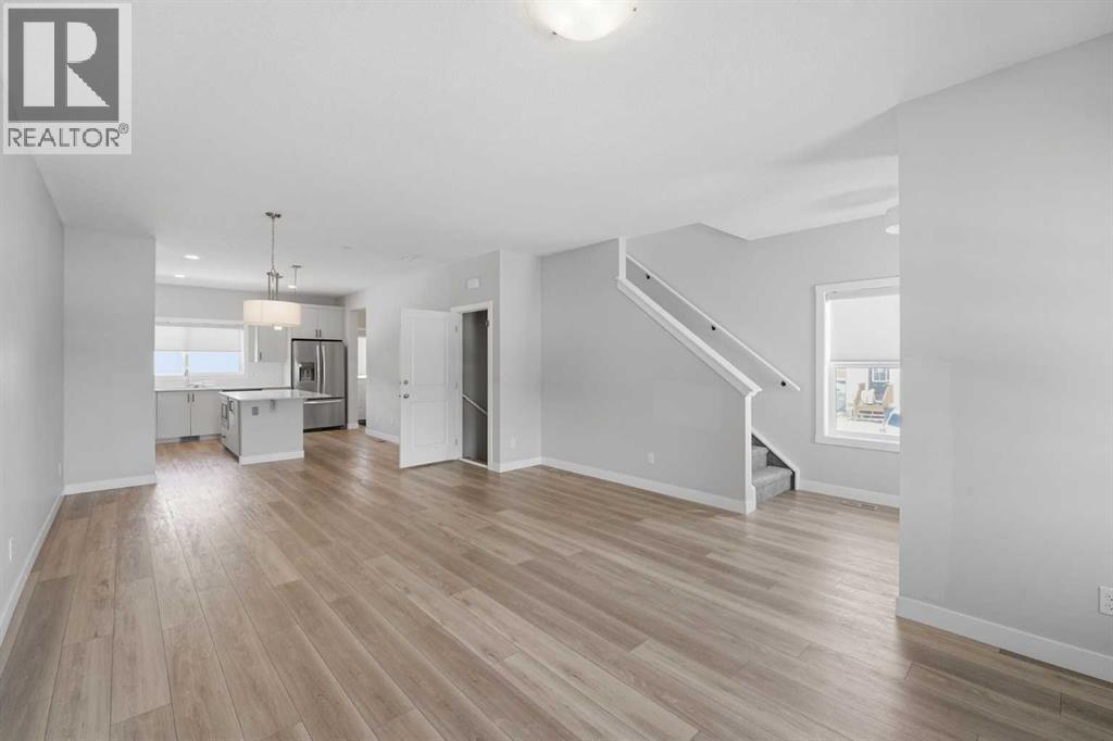 125 Edith Gate Nw, Calgary, Alberta  T3R 1Z2 - Photo 4 - A2295954