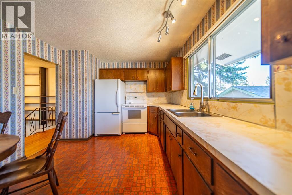 3030 31a Street SE, Calgary, Alberta  T2B 0S9 - Photo 10 - A2303930