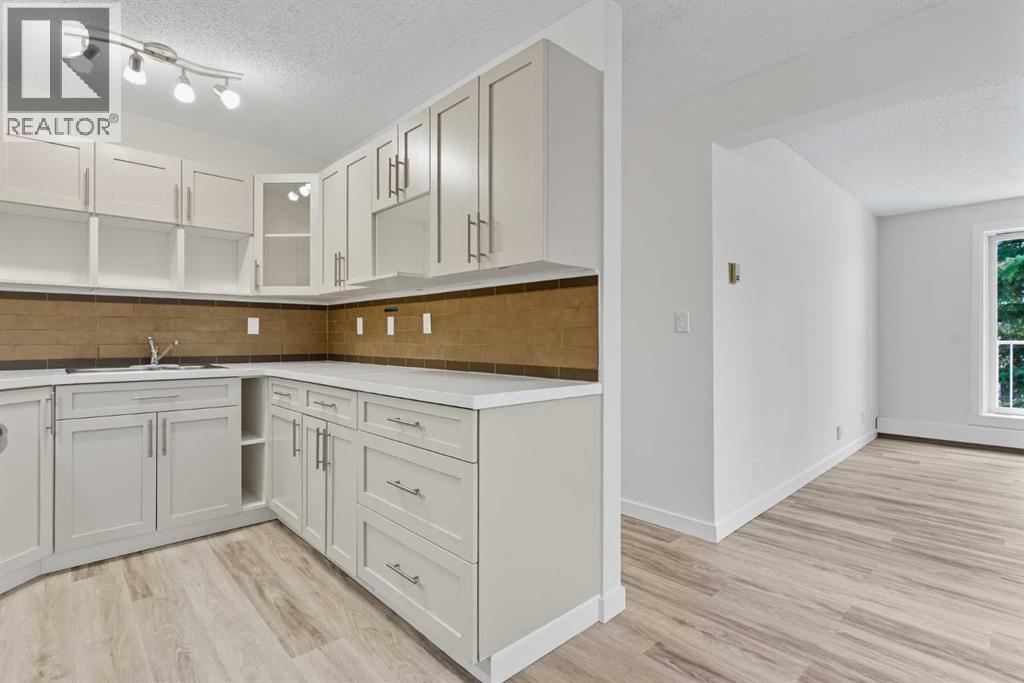 302a, 5601 Dalton Drive NW, Calgary, Alberta  T3A 2E2 - Photo 5 - A2296265