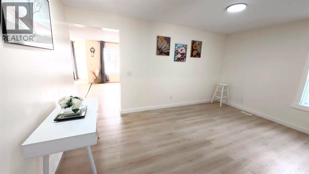 217 Coopers Grove Sw, Airdrie, Alberta  T2B 0G4 - Photo 7 - A2303255