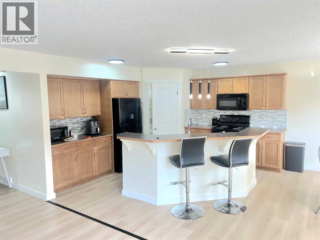 217 Coopers Grove Sw, Airdrie, Alberta  T2B 0G4 - Photo 14 - A2303255