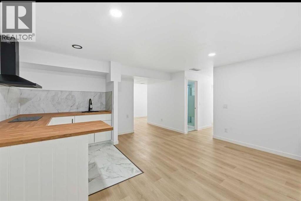 217 Coopers Grove Sw, Airdrie, Alberta  T2B 0G4 - Photo 27 - A2303255