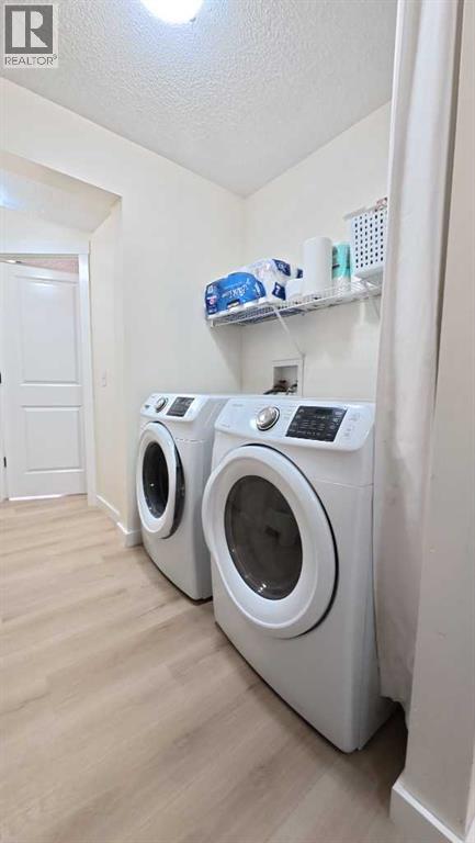 217 Coopers Grove Sw, Airdrie, Alberta  T2B 0G4 - Photo 18 - A2303255