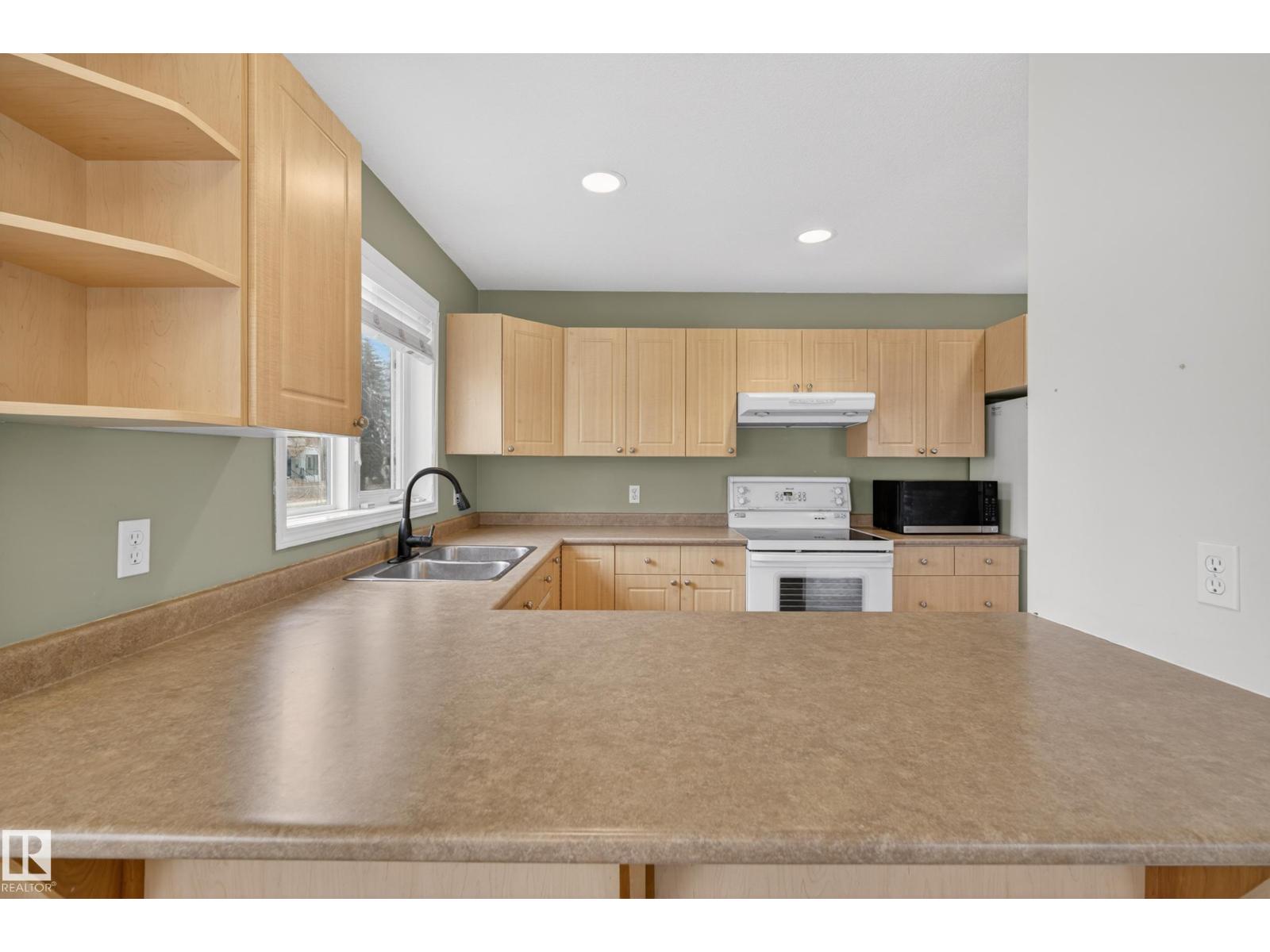 8721 88 Av Nw, Edmonton, Alberta  T6C 1J4 - Photo 12 - E4484132