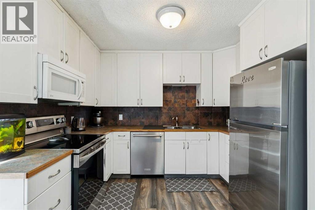 113, 107 Elm Place, Okotoks, Alberta  T1S 1J1 - Photo 7 - A2292596