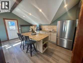 216 Cottageclub Crescent, Rural Rocky View County, Alberta  T4C 1B1 - Photo 16 - A2302814