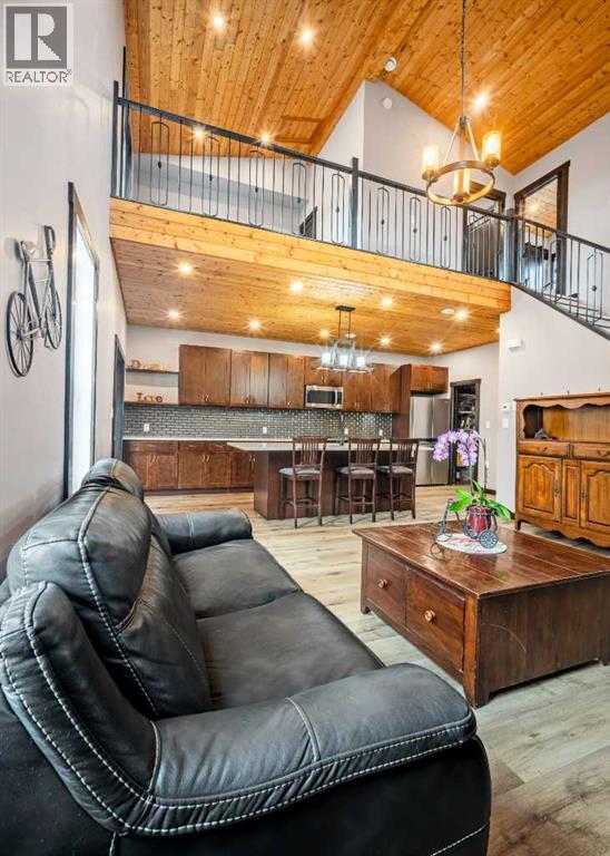 216 Cottageclub Crescent, Rural Rocky View County, Alberta  T4C 1B1 - Photo 8 - A2302814