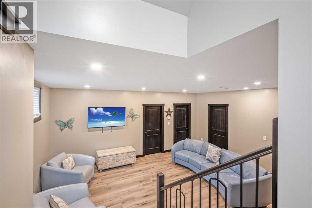 216 Cottageclub Crescent, Rural Rocky View County, Alberta  T4C 1B1 - Photo 14 - A2302814