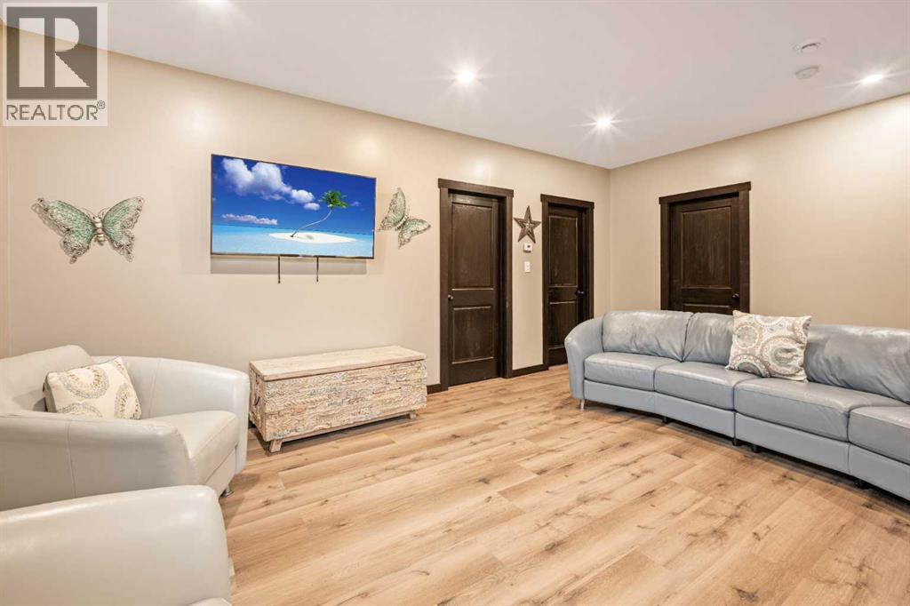 216 Cottageclub Crescent, Rural Rocky View County, Alberta  T4C 1B1 - Photo 12 - A2302814