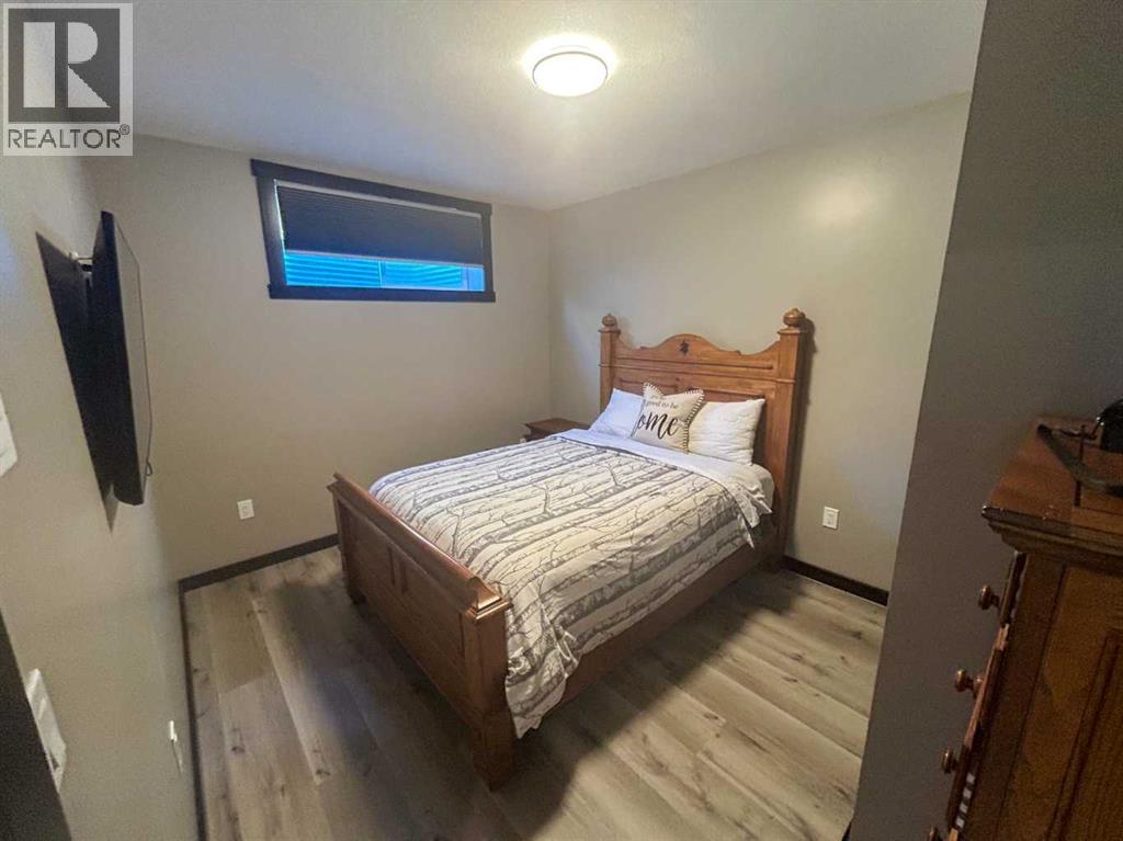 216 Cottageclub Crescent, Rural Rocky View County, Alberta  T4C 1B1 - Photo 15 - A2302814