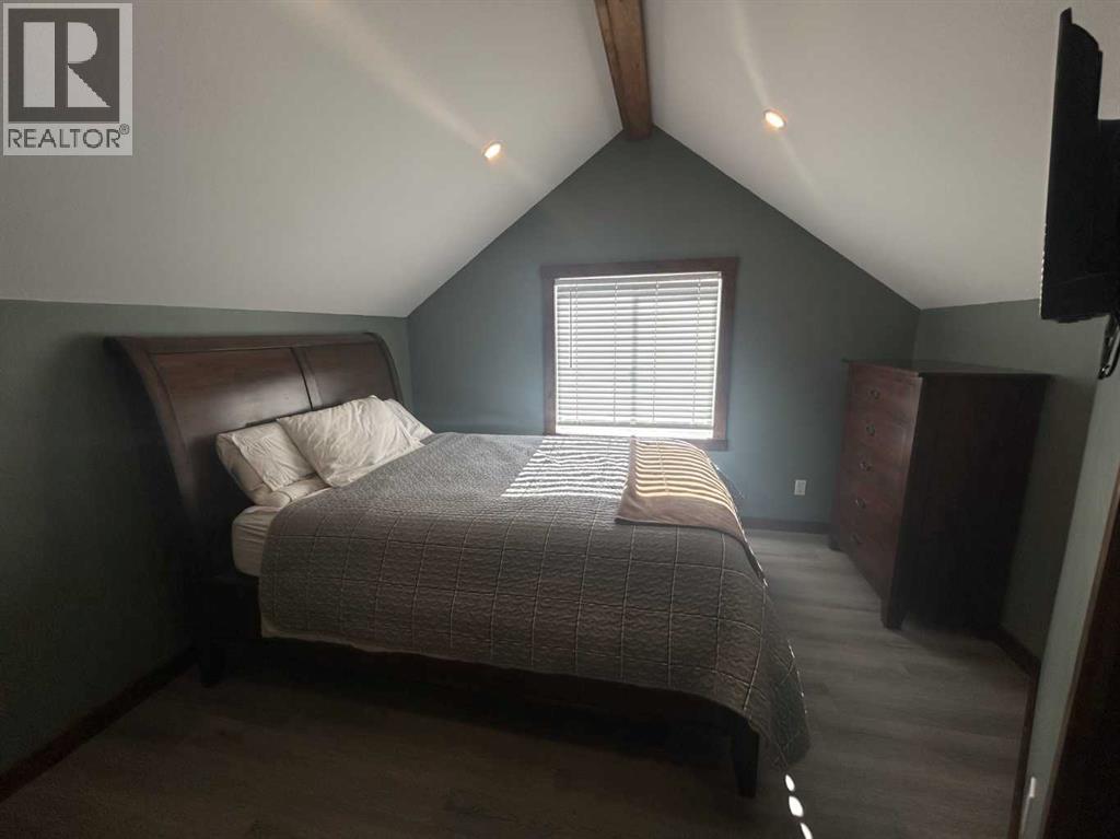 216 Cottageclub Crescent, Rural Rocky View County, Alberta  T4C 1B1 - Photo 19 - A2302814