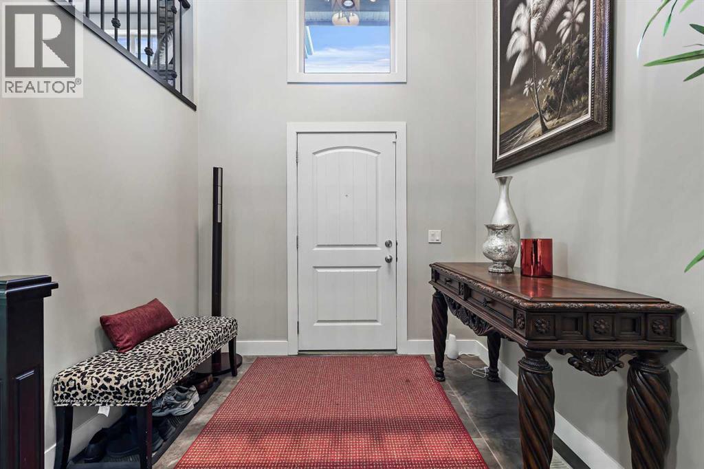 22 Wendham Place SW, Calgary, Alberta  T3H 0R6 - Photo 4 - A2294143