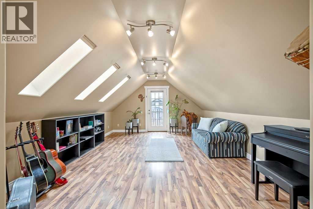 105 Lang Place, Okotoks, Alberta  T1S 1W8 - Photo 35 - A2301740