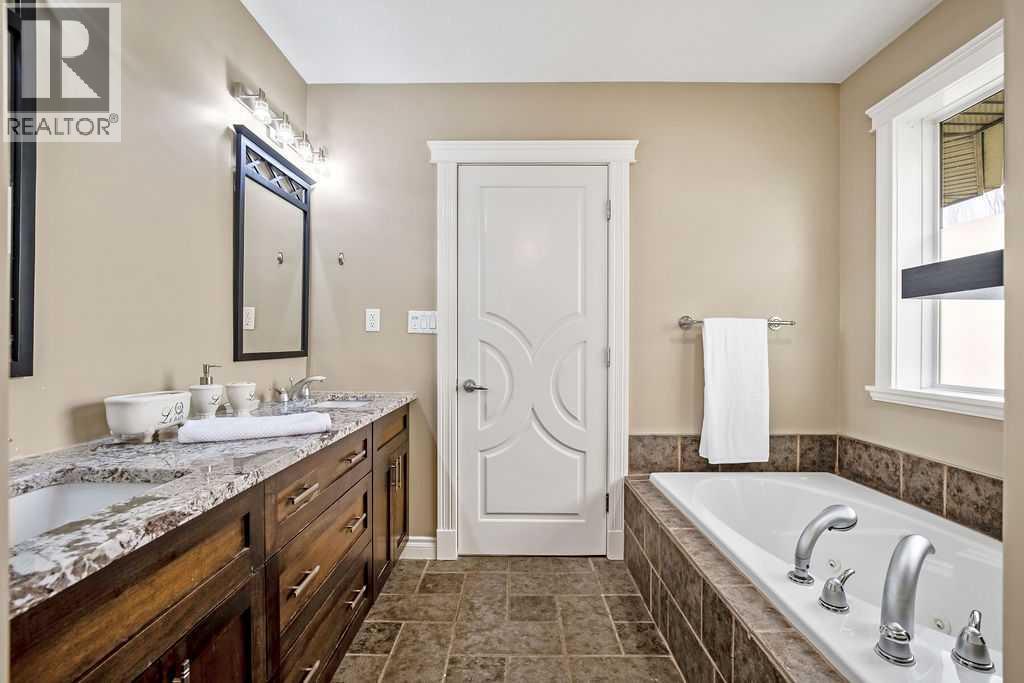 105 Lang Place, Okotoks, Alberta  T1S 1W8 - Photo 28 - A2301740