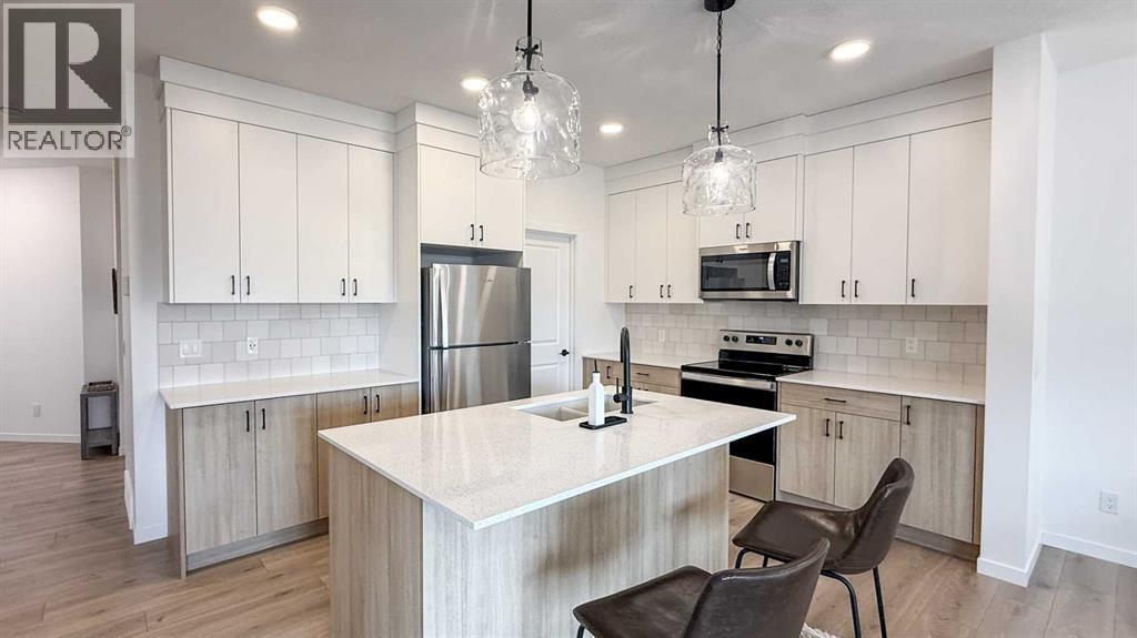 115 Fireside Street, Cochrane, Alberta  T4C 3J2 - Photo 4 - A2303910